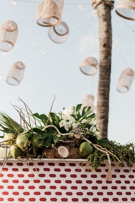 Custom floral and bar for a wedding welcome party in the Bahamas.