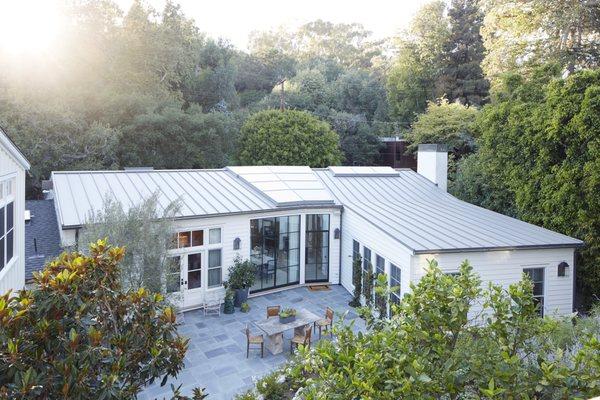 Rear facade of a ranch house renovation. Photo by Roger Davies Photography.