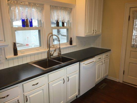 Installed new countertop, sink and backsplash