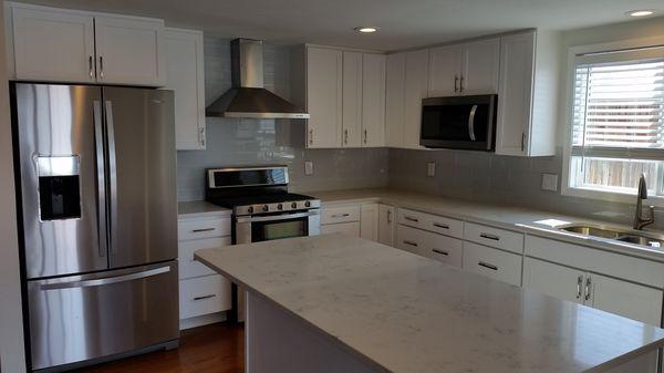 Happy customers!!  Beautiful kitchen - exactly what we wanted.