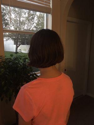 Cut it to the shoulders was what we asked them to do. And this is what they did made my 16 year old daughter look like a boy with that cut.