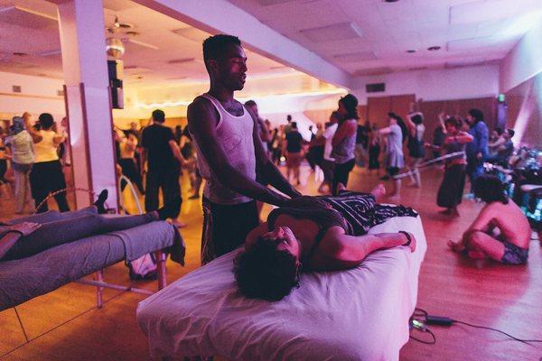 Atasiea doing Reiki (energy healing) at Ecstatic Dance LA