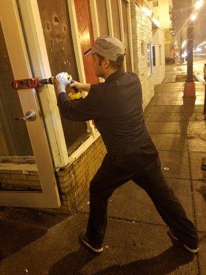 Lock Doctor drilling an aluminum door to install a deadbolt- this requires some rare tools and knowledge