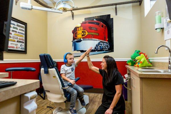 Our patients love the train theme and the mini-train that chugs along throughout the office!