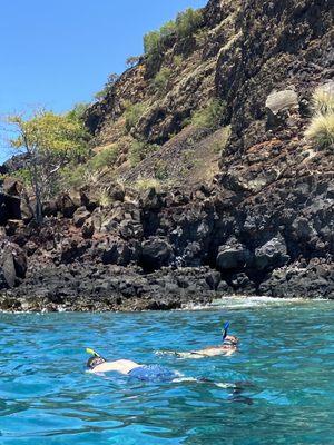 Non snorkelers floating and seeing lots of reef and fish