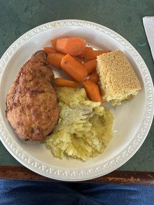 Fried chicken, carrots, cornbread and mashed potatoes