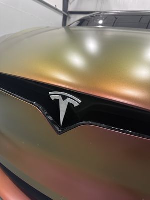 Tesla Model X Plaid. Wrapped in Avery Satin Rising Sun. Wrapped by Detailtopia.