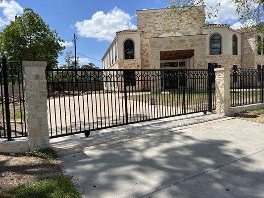 New slide gate and matching fencing.