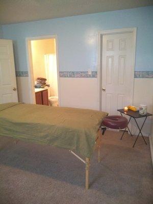 Massage room with fully functional bathroom and shower