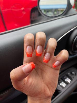 orange french tip gel manicure