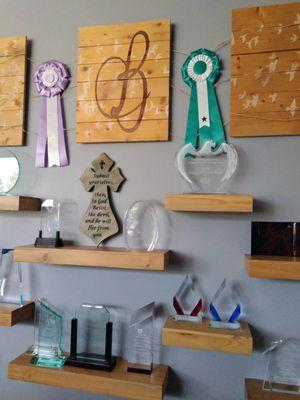 Ribbon awards, crystal awards, even personalized home decor items.