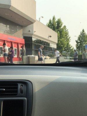 Line for atm's at popular bank