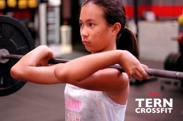 Emily (10), one of our CrossFit Kids working up to a heavy Front Squat.