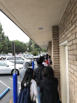 At 7:35am, the line moved just enough to turn the corner from the back of the building.