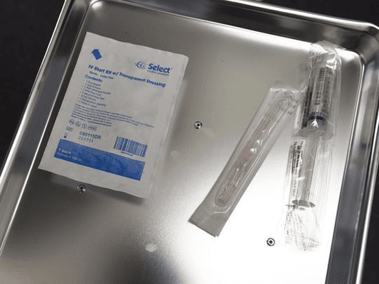 Tray of IV supplies, ready to be used on a new patient.