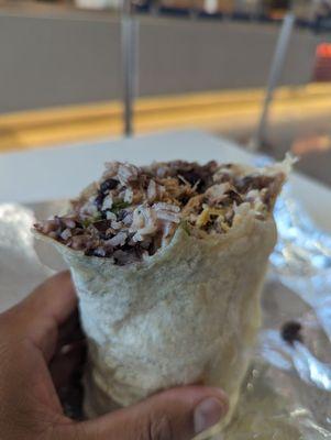 My pulled pork burrito with white rice, black beans, etc.