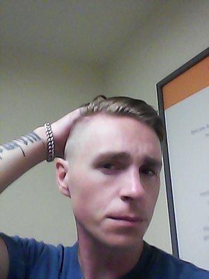 Went with the shaved sides kept it long on top Rom did a great job!