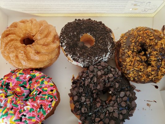 Assorted Donuts: Mud,  Vanilla Sprinkle, French Cruller, Marshmallow Oreo and Samoa.