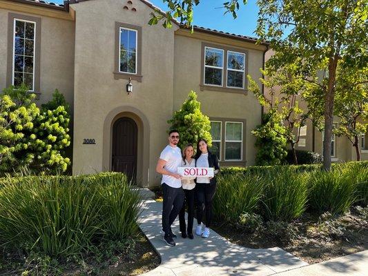 Our realtor Angelica celebrating with us after helping us secure our first house!