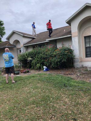 Lyon Home Enterprises Roof Inspectors study this home owners roof to assist with the replacement process