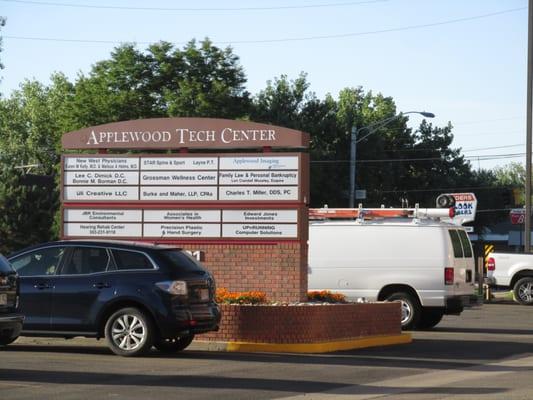 the clinic or wellness center is located in a large brick and glass office type building called the Applewood Tech Center