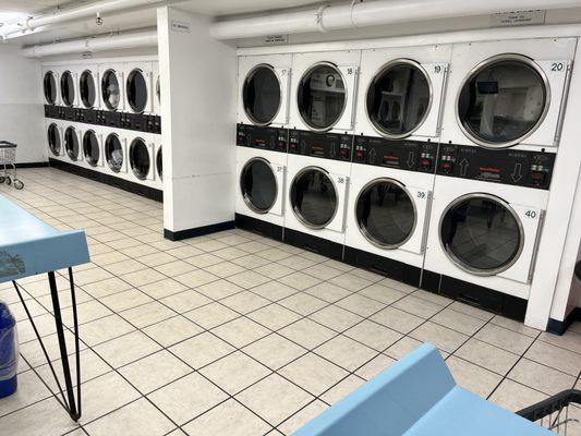 Dryers along the back wall.