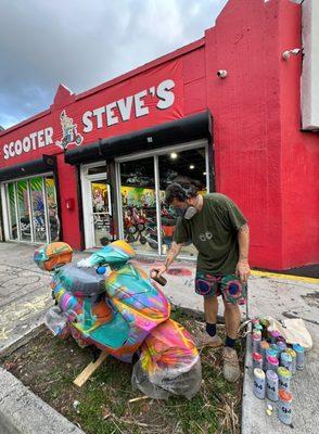 Live scooter painting by local artist Captain Casual