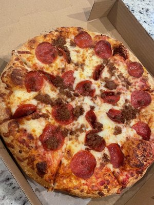 Pepperoni and sausage pizza