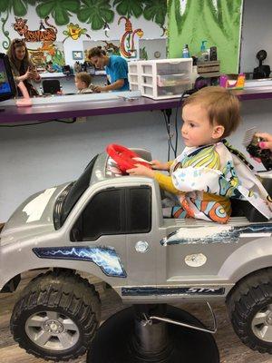 My little love enjoyed his drive while getting his hair cut