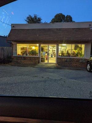 Old timey store but full of flowers