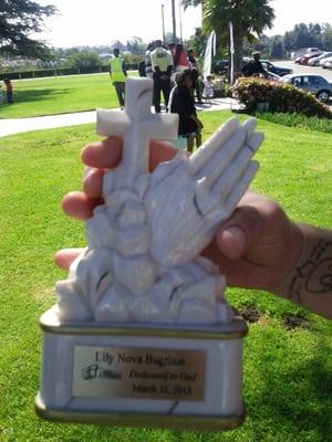 Beautiful praying hands with the Cross and name engraved compliments of the church.