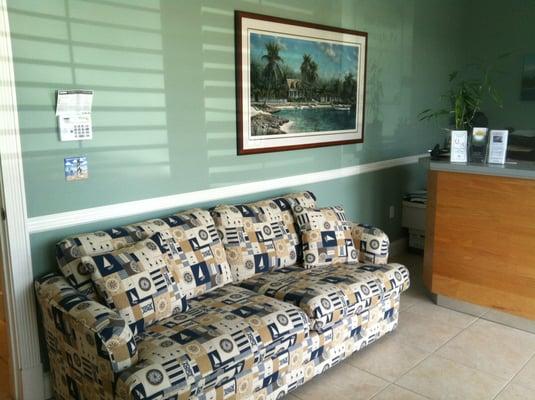 If couches are more your style, enjoy our nautical themed couch while waiting for us to meet with you!