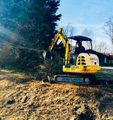 Land Clearing, excavation, tree removal, brush debris hauling, yard clean up, grading, ditching