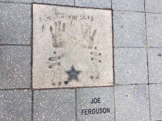 5/5/17. Buffalo Bills Wall of Fame Quarterback and Shreveport native Joe Ferguson's imprints outside here.