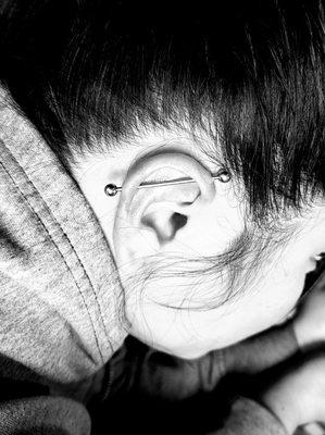 Industrial piercing. Professional work only. Call us at 6195429410 if you have any questions or would like to make an appointment.