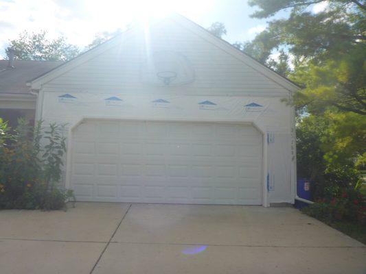 After the wood rot was taken down and the new wood up and wrapped until the siding guy gets here.