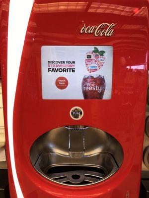 Inside they have the cool new Coke machine.