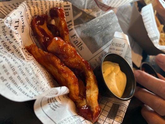 "Zingers". Basically a boneless unbreaded  boneless breast smothered in sauce