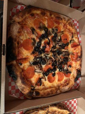 Mushrooms, black olives and pepperonis cooked to perfection.