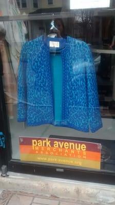 Cute cerulean jacquard coat in the window