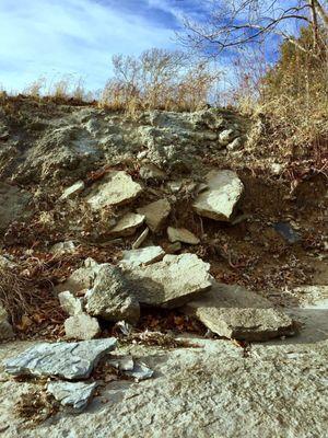 Cement wall broken into pieces and falling.  Be careful!  11/24/2017