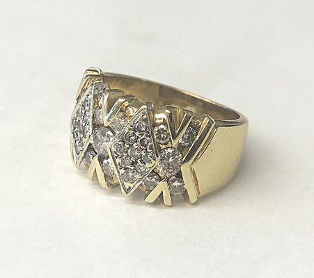 Beautiful 14K gold and diamonds ring. Big enough for statement jewelry, comfortable enough to be worn everyday.