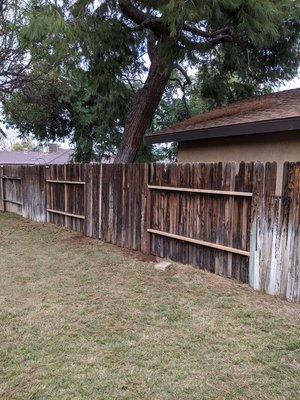 Fence Repaired after being damaged by strong winds.