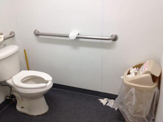 The ladies room. Not sure where the toliet paper holder even was but the roll there was empty!