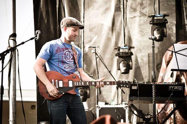 Brandon Croft playing on the main stage at McDowell Mountain Music Festival