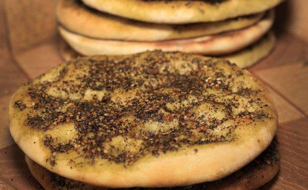 Za'atar 
Mediterranean Pizza 
Flatbread topped with a blend of sesame seeds, olive oil, Mediterranean herbs