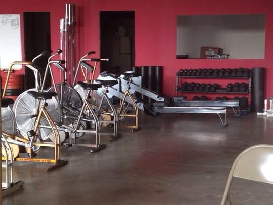 Cardio area. Bunch of Airdyne bikes and row machine