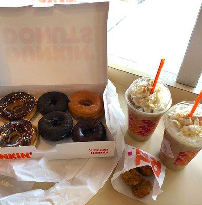 half a dozen donuts, hashbrowns, and caramel craze iced lattes