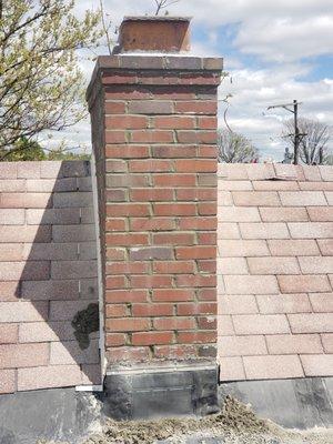 Another chimney repointed and new cement cap.