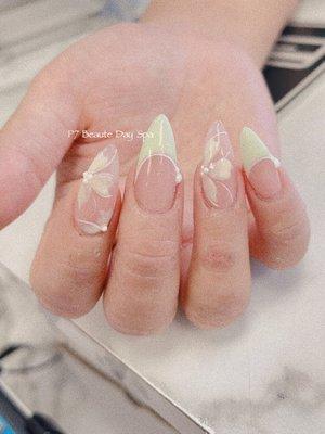 Apres Gel-X almond shape light green French tips, flowers and pearl designs.  Japanese nail art. Spring summer nail inspo